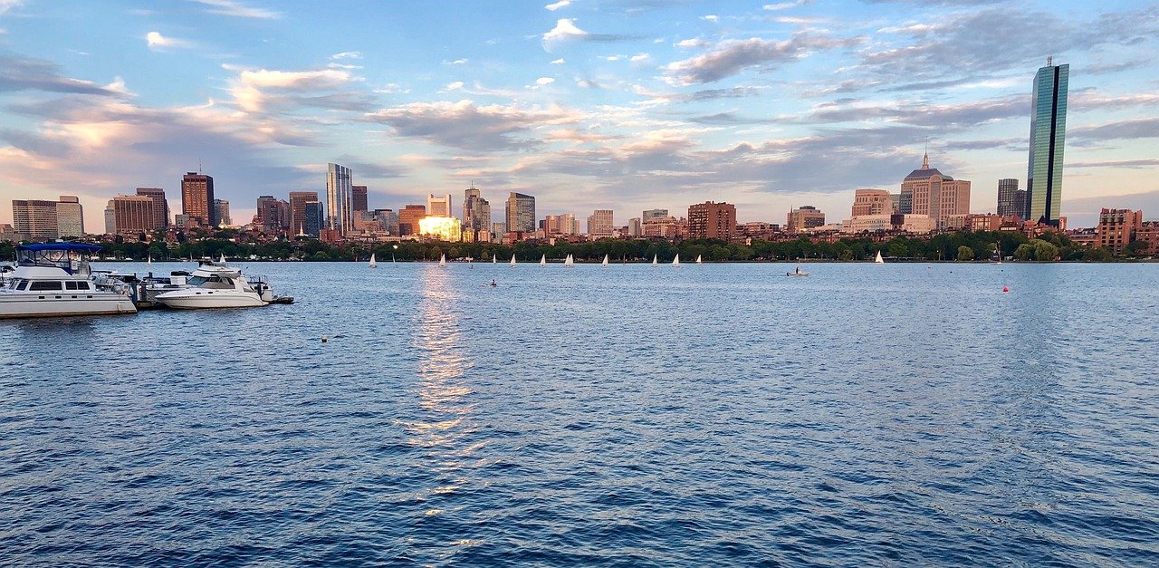 A picture of the Boston skyline taken from the Charles River.